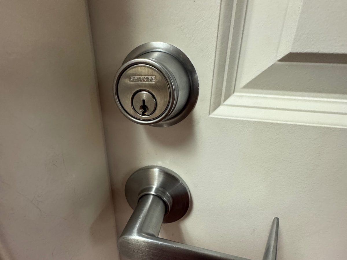 Schlage deadbolt and lever handle set installed on a home door