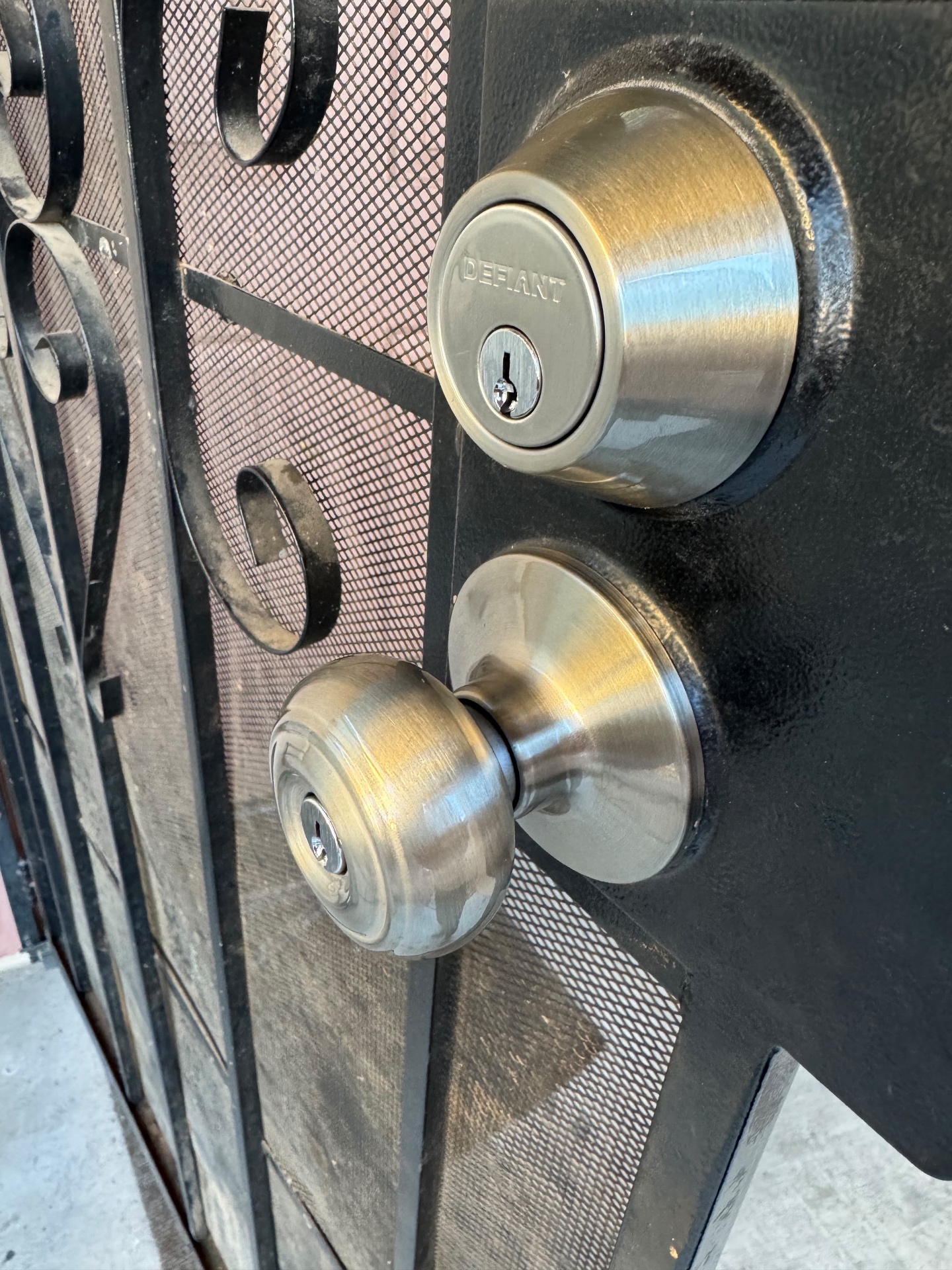New Grade 1 deadbolt installed on a residential entry door